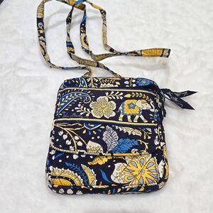 Vera Bradley crossbody bag with multiple pockets. Black, blue, white, yellow